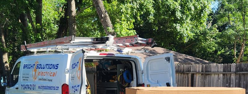 Bright Solutions Electrical service van loading a Generac generator