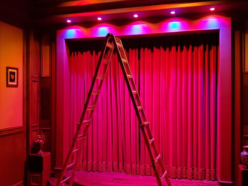 Custom color-changing LED accent lighting installed in a home theater