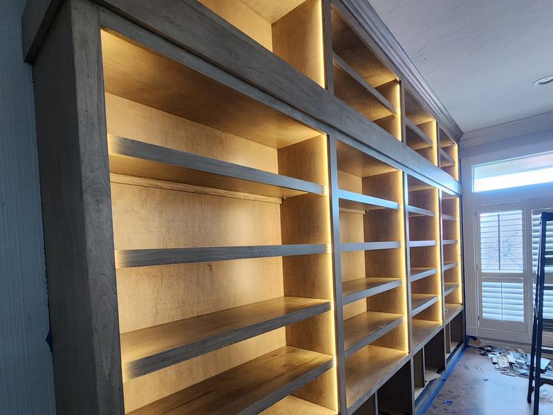 Custom wine storage shelving with integrated LED lighting