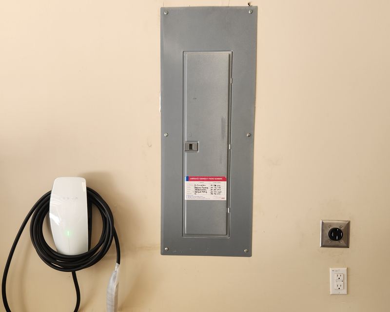 Indoor electrical panel with outlets and lighting control system
